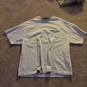 Kids essentials fear of god tee shirt
